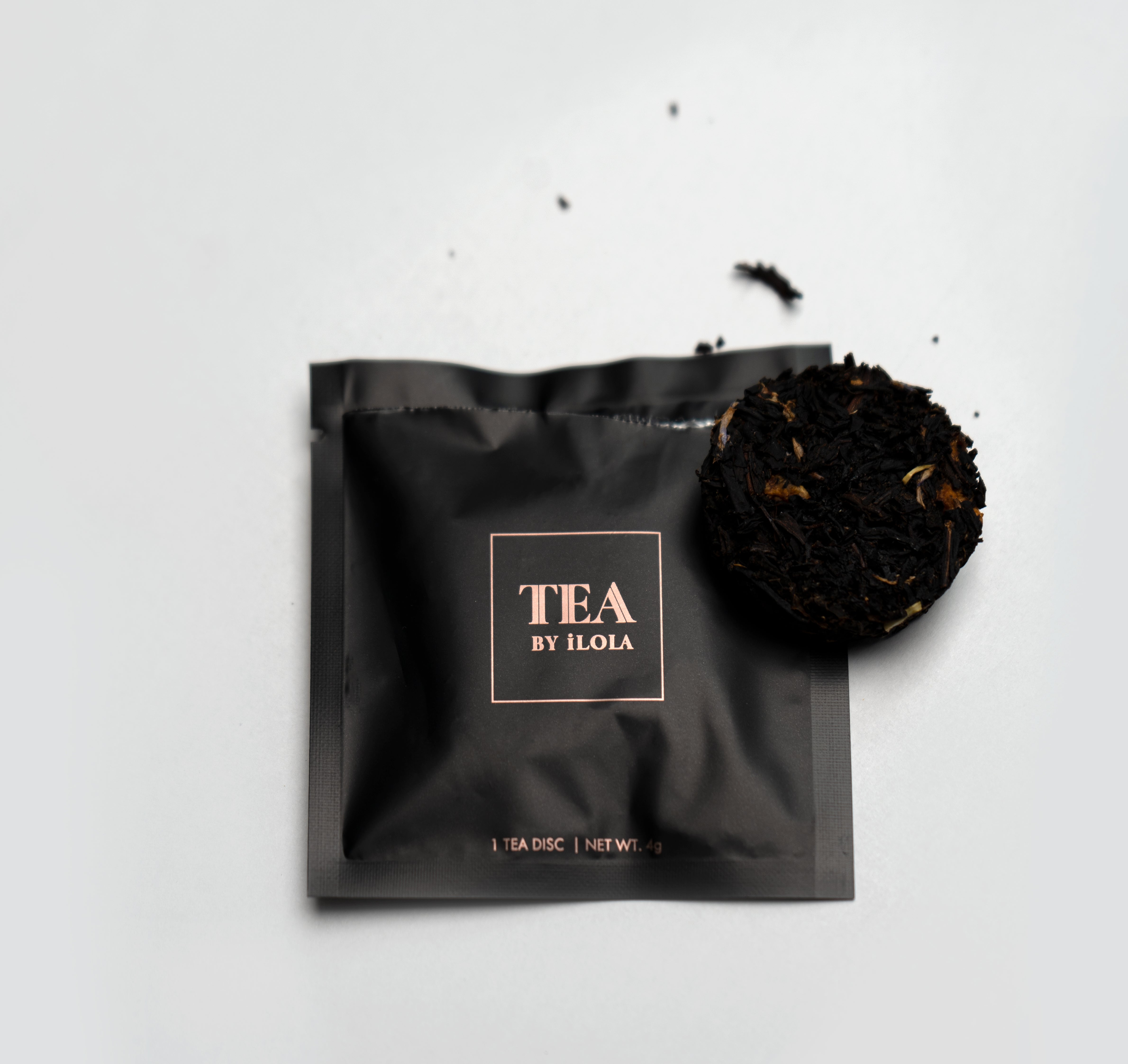 Single iLOLA Tea Disc sachet and loose Tea Disc